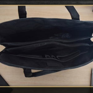 Inside organization showing card slots and pen holders in the black leather