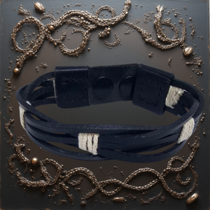 Handmade leather bracelet with jute weave on a beach setting, featuring text about product features. footy,collingwood,football,club,AFL,
#AFL #Footy #AustralianRulesFootball #AFLBracelets #HandmadeJewelry #FootyFans

