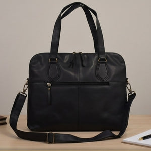 Secure rear zip pocket view of the black daily business messenger bag